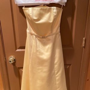 Pale yellow tea length strapless gown size 6